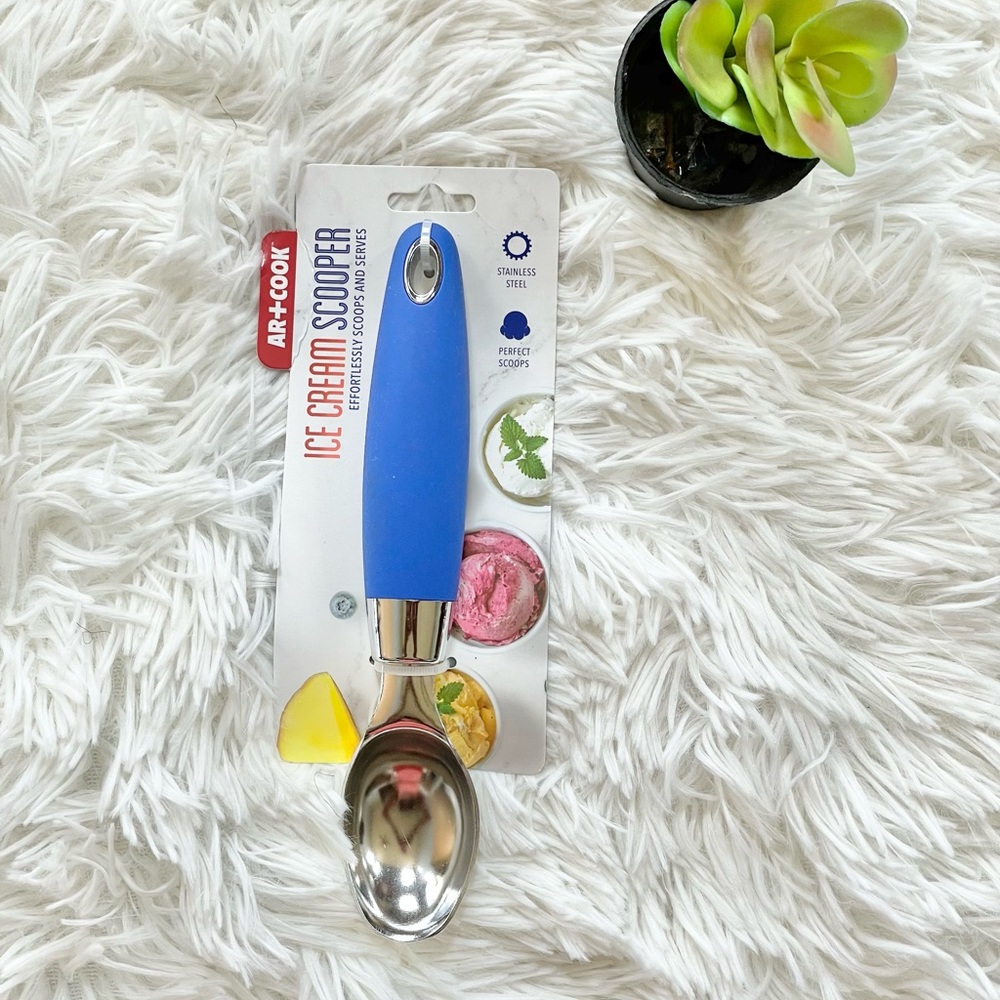 New with tags STAINLESS STEEL ICE-CREAM SCOOP. Silicone easy grab & grip handle